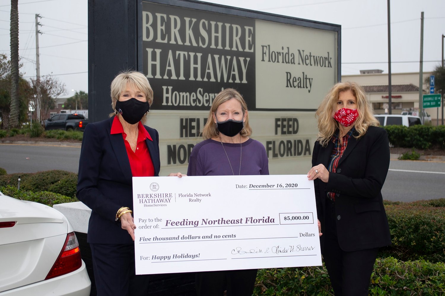 Berkshire Hathaway HomeServices FNR presents a $5,000 donation to Feeding Northeast Florida. From left: Linda Sherrer, Berkshire Hathaway HomeServices Florida Network Realty founder and chairman; Susan King, president and CEO of Feeding Northeast Florida; Ann King, Berkshire Hathaway HomeServices Florida Network Realty vice president of brokerage.